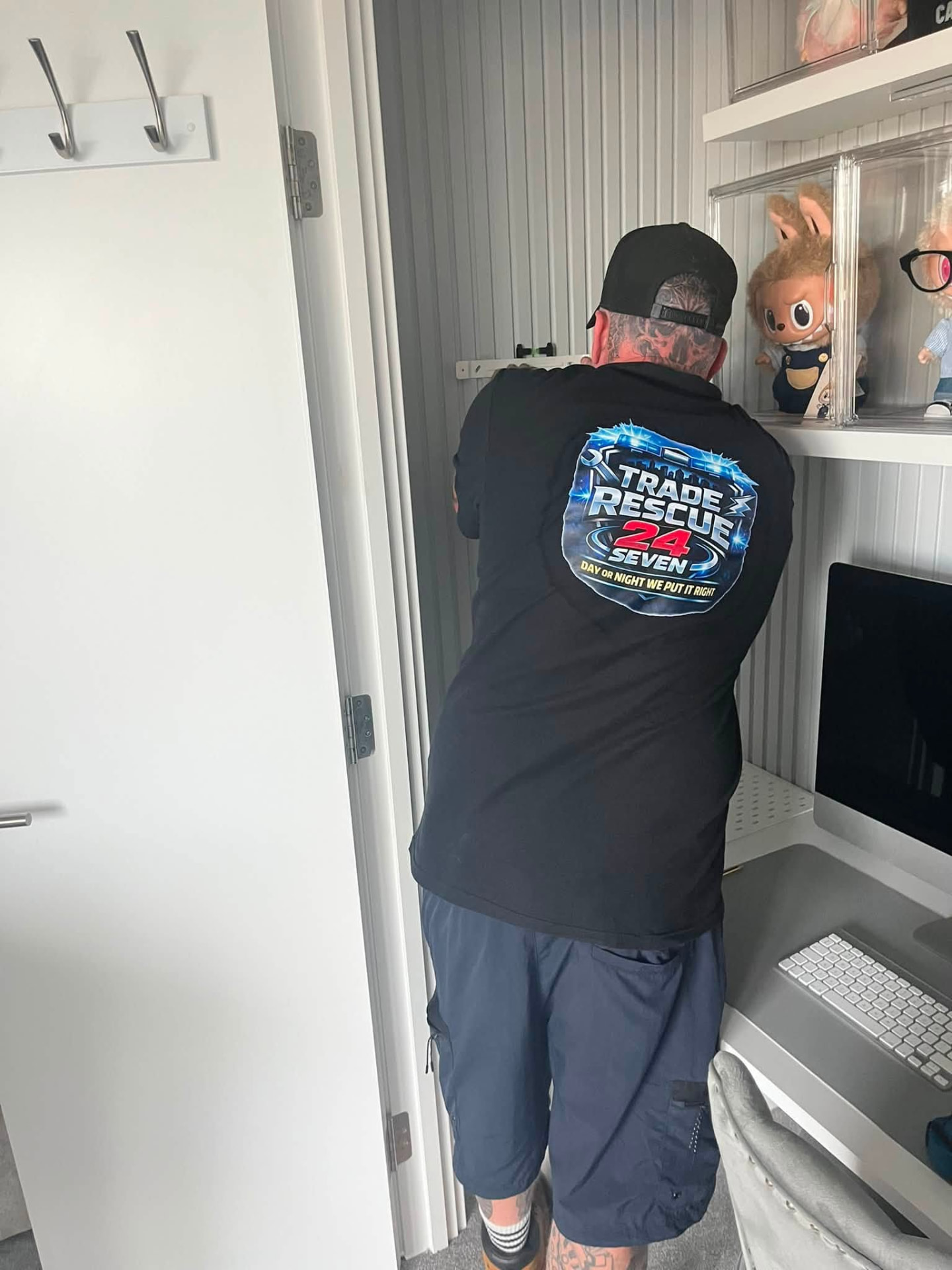 Trade Rescue 24/7 engineer in branded workwear on site