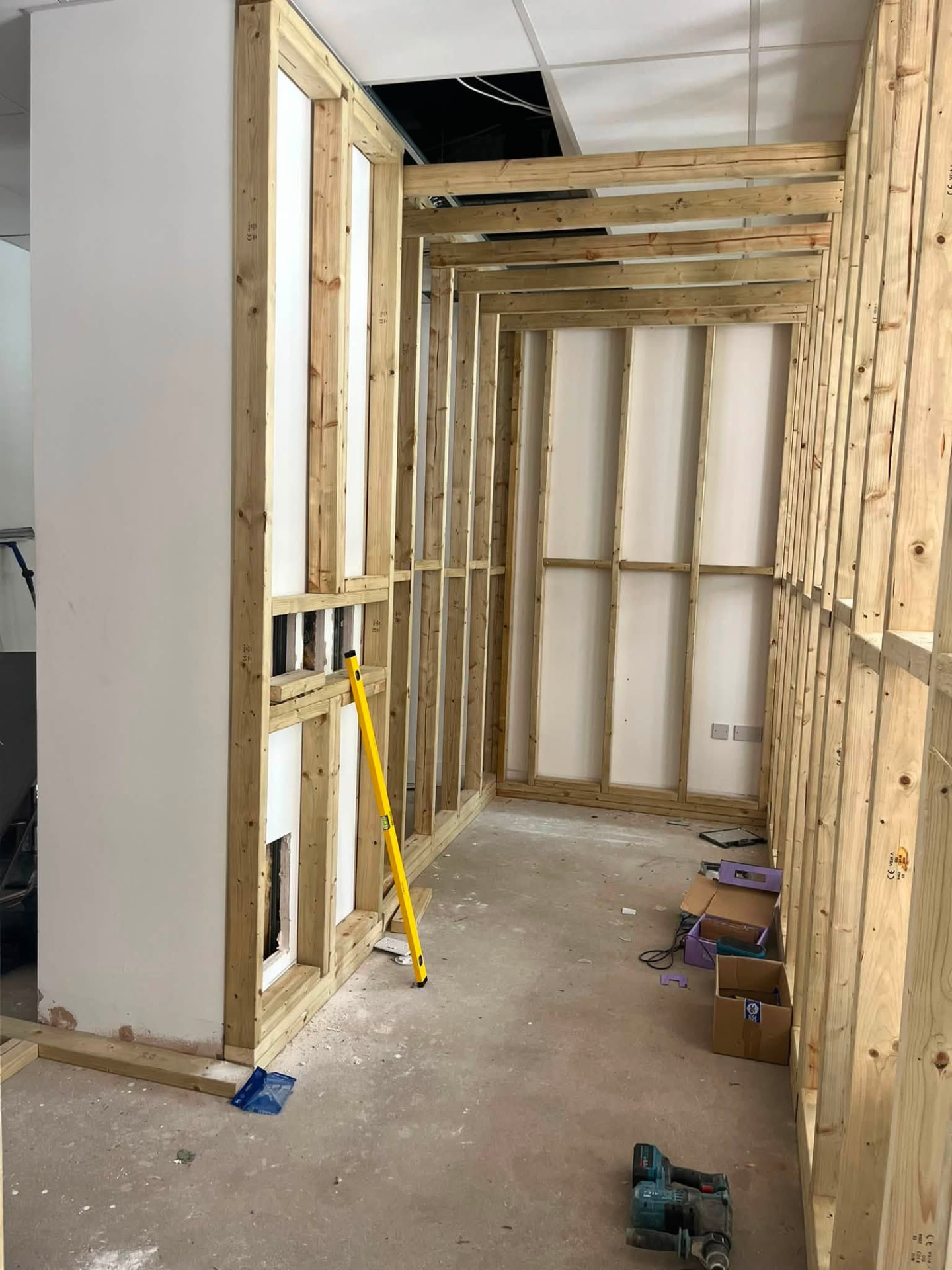 Full height timber framing and head plates forming the new layout