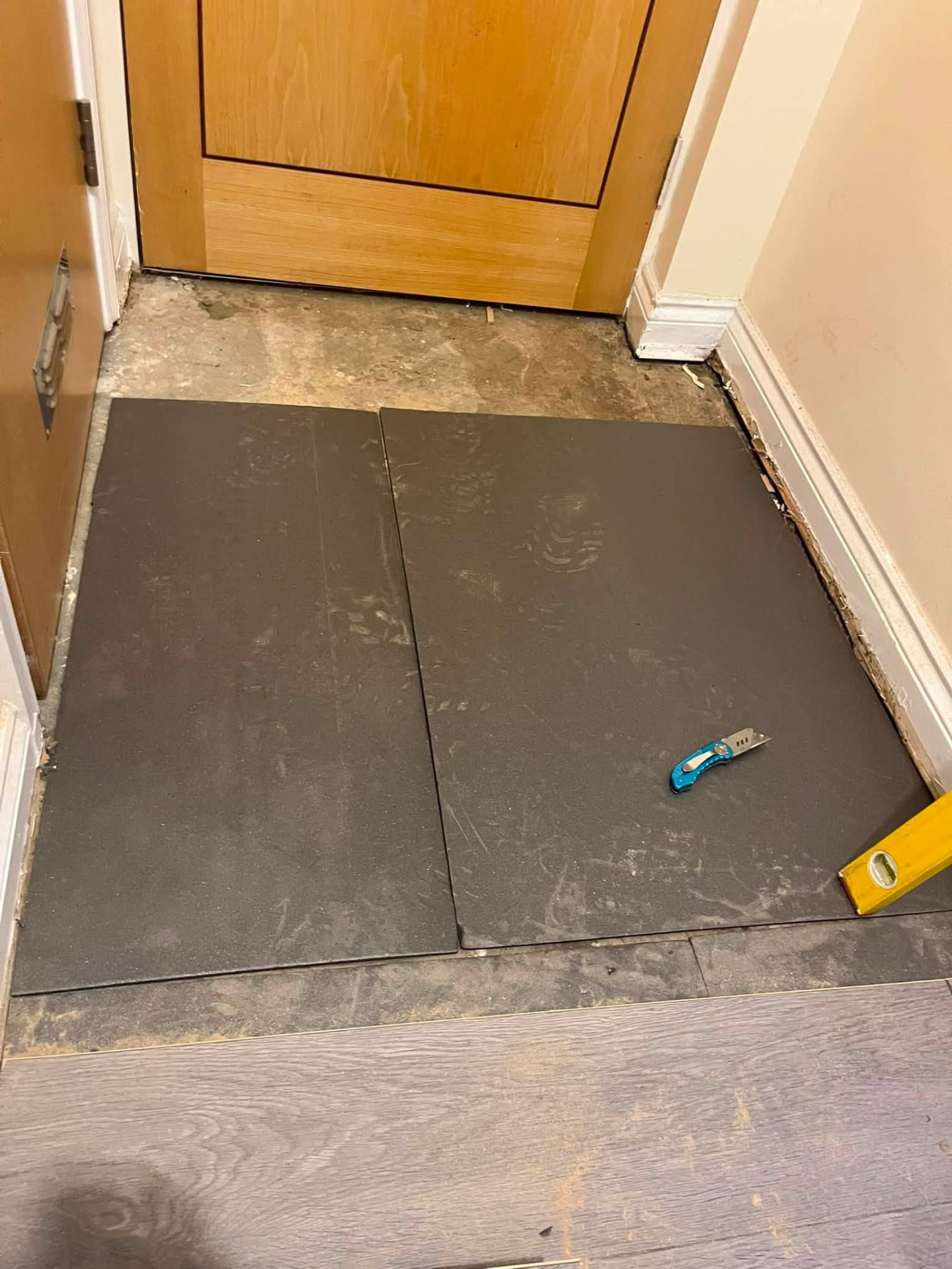 Fresh underlay boards laid in the doorway ready for the laminate finish
