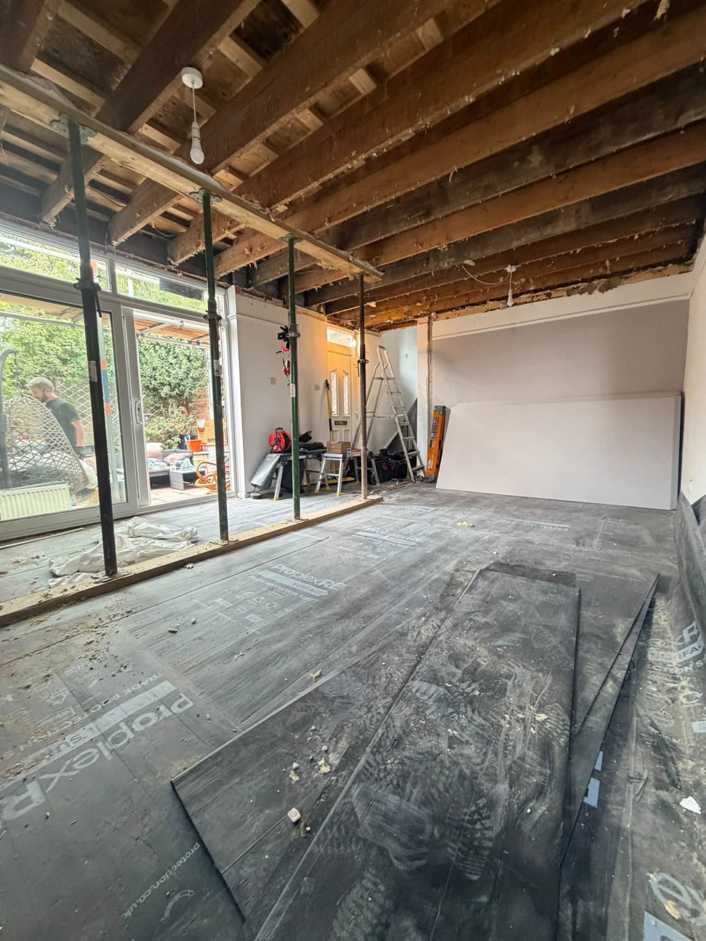 Room cleared and prepped with exposed joists ready for rebuilding