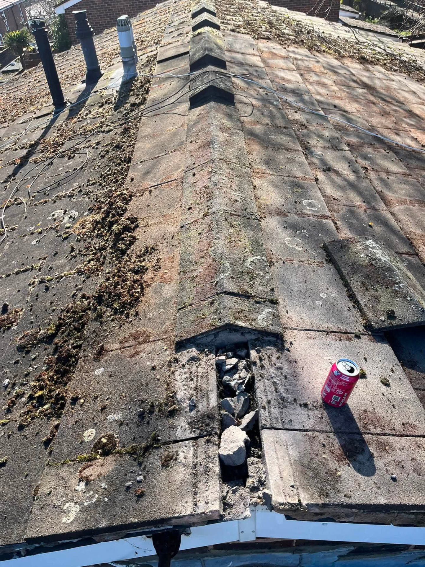 Ridge line opened up showing broken mortar and loose bedding along the hip
