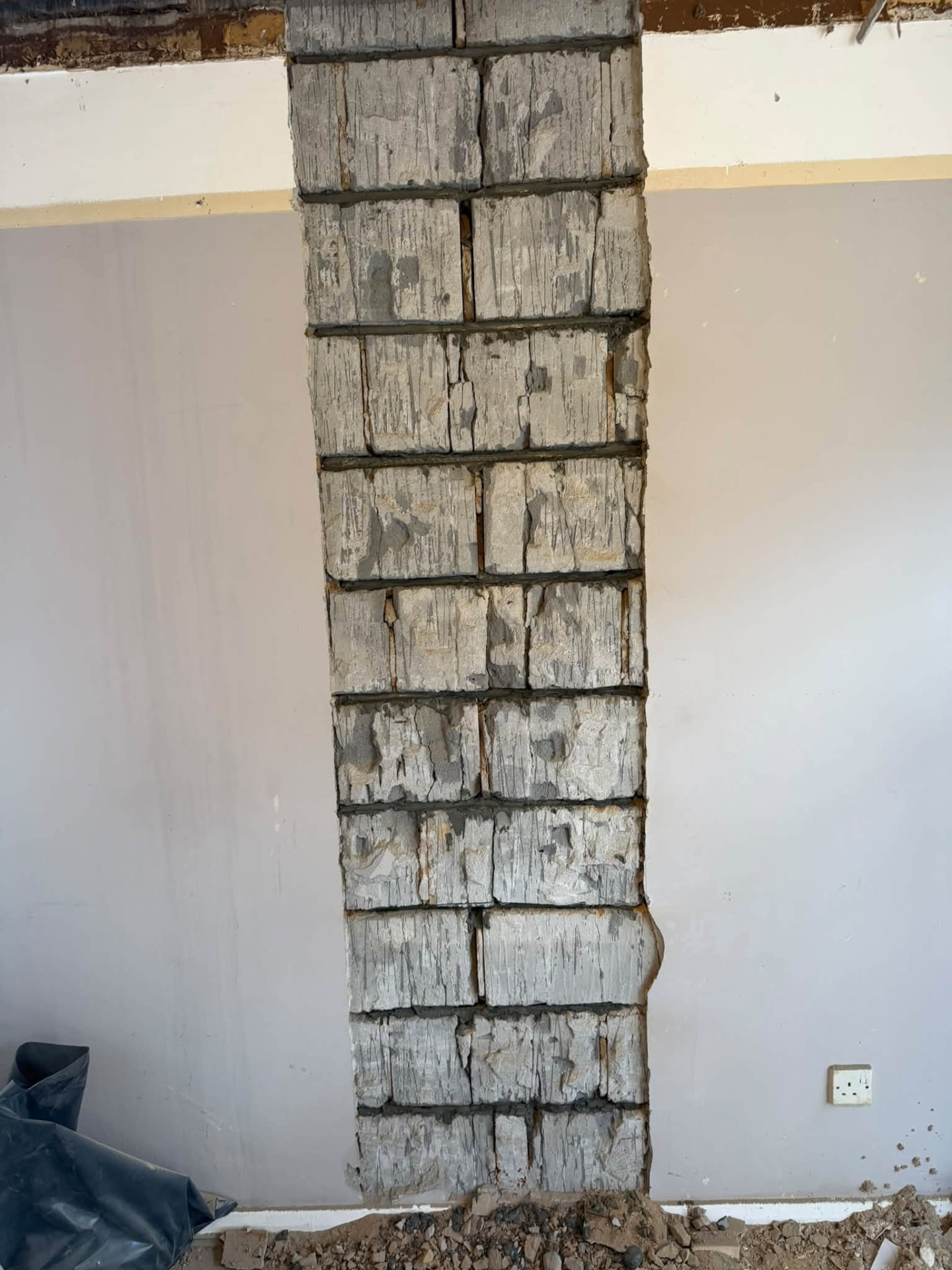 Rebuilt blockwork pier repointed and ready for finishing