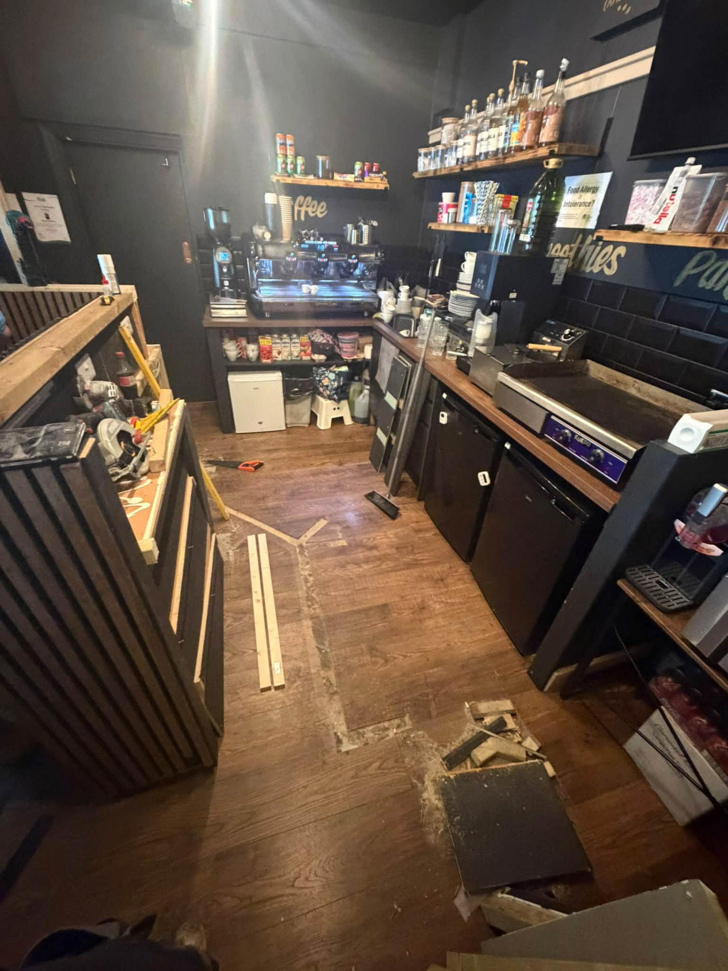 Counter area cleared with new framework layout marked on the floor