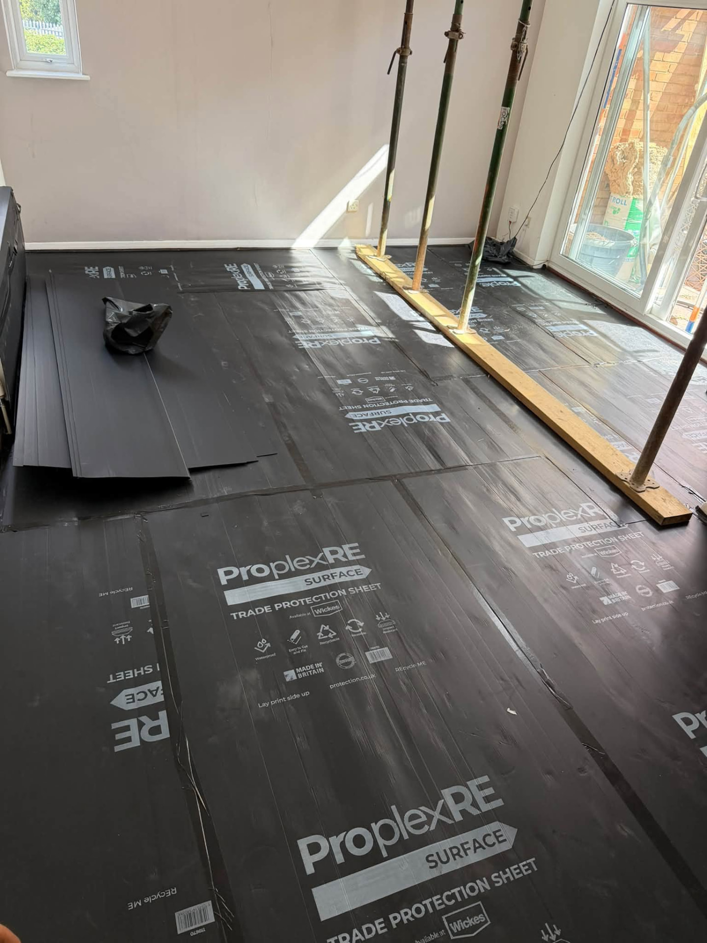 Floor protection laid throughout the room ahead of the refurbishment works