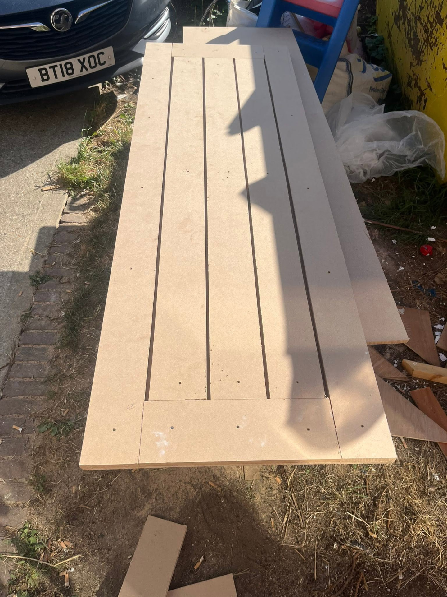 MDF door frame with vertical panel battens fitted