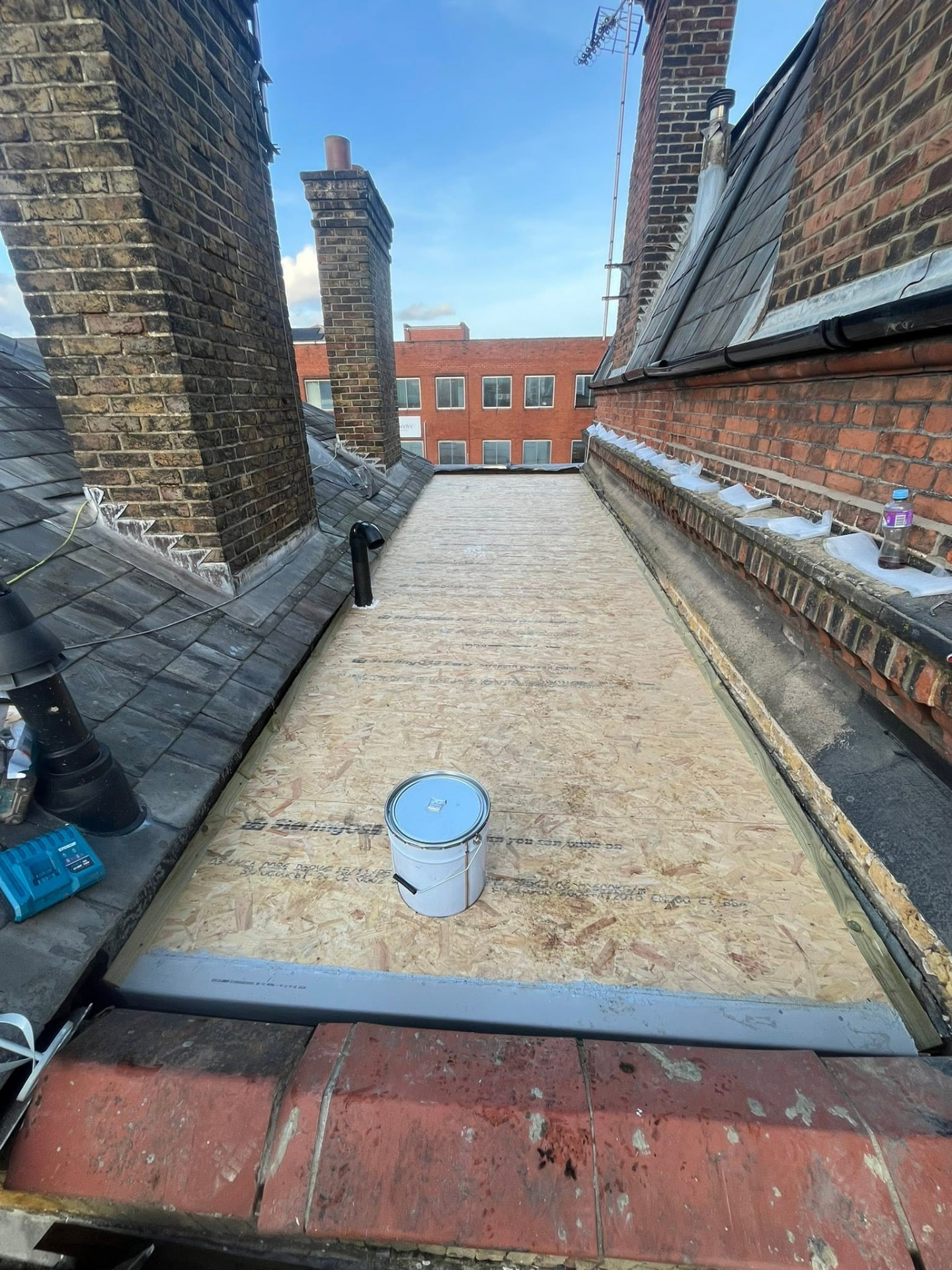 Prepared OSB deck with GRP trims fitted ready for coating