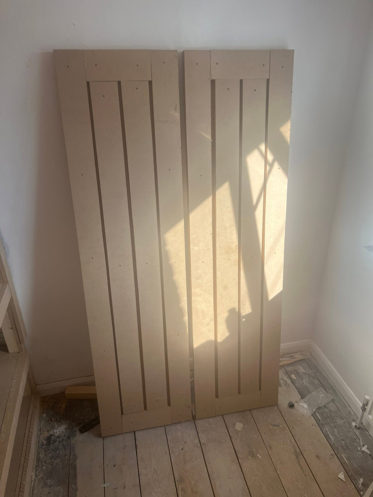 Finished wardrobe doors primed and ready for hanging