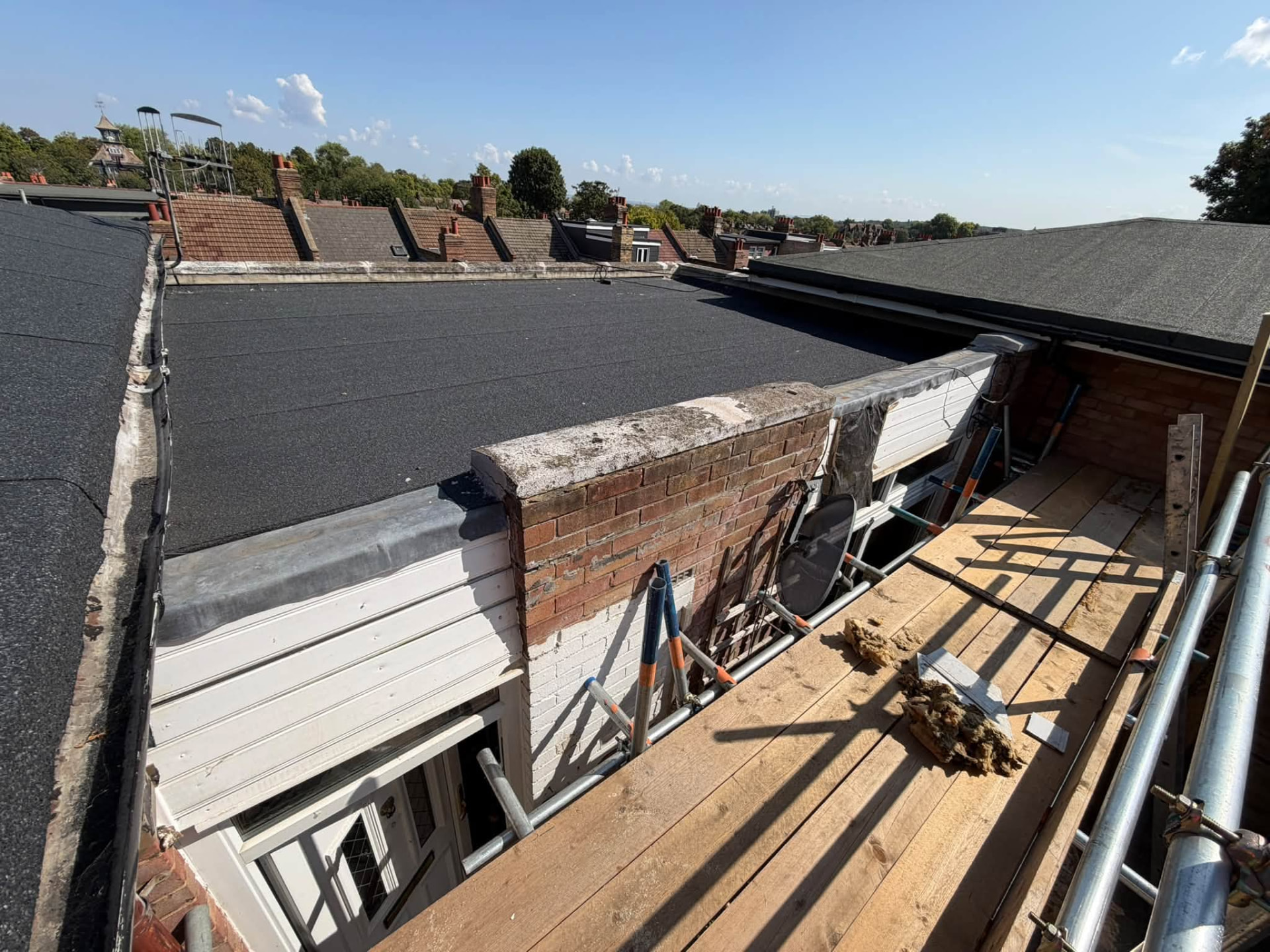 Flat roof, leadwork and external cladding repairs from the scaffold