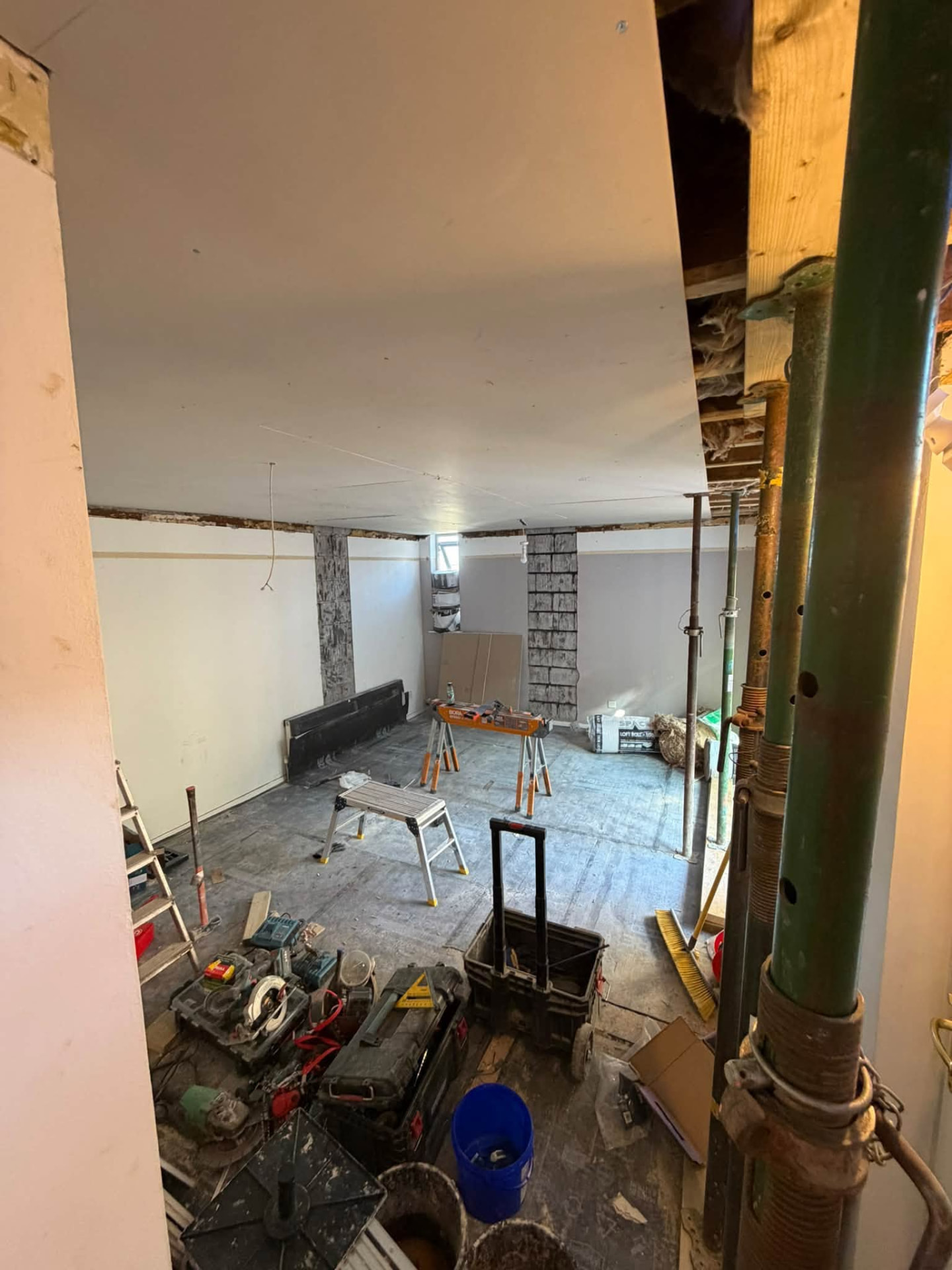Wide view of the room during rebuild with props and tools in place
