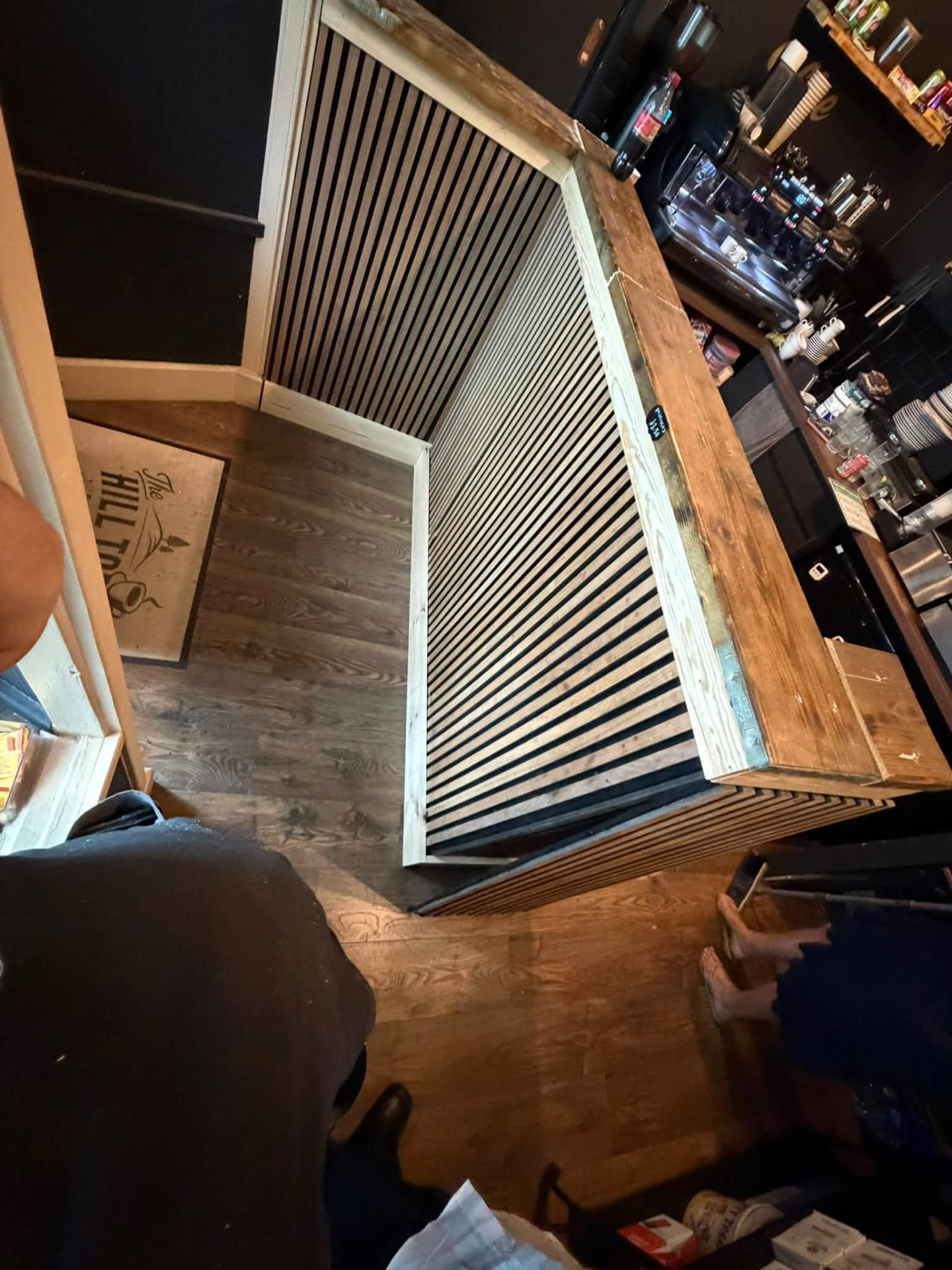 Slatted oak-effect front panels fitted to the rebuilt counter