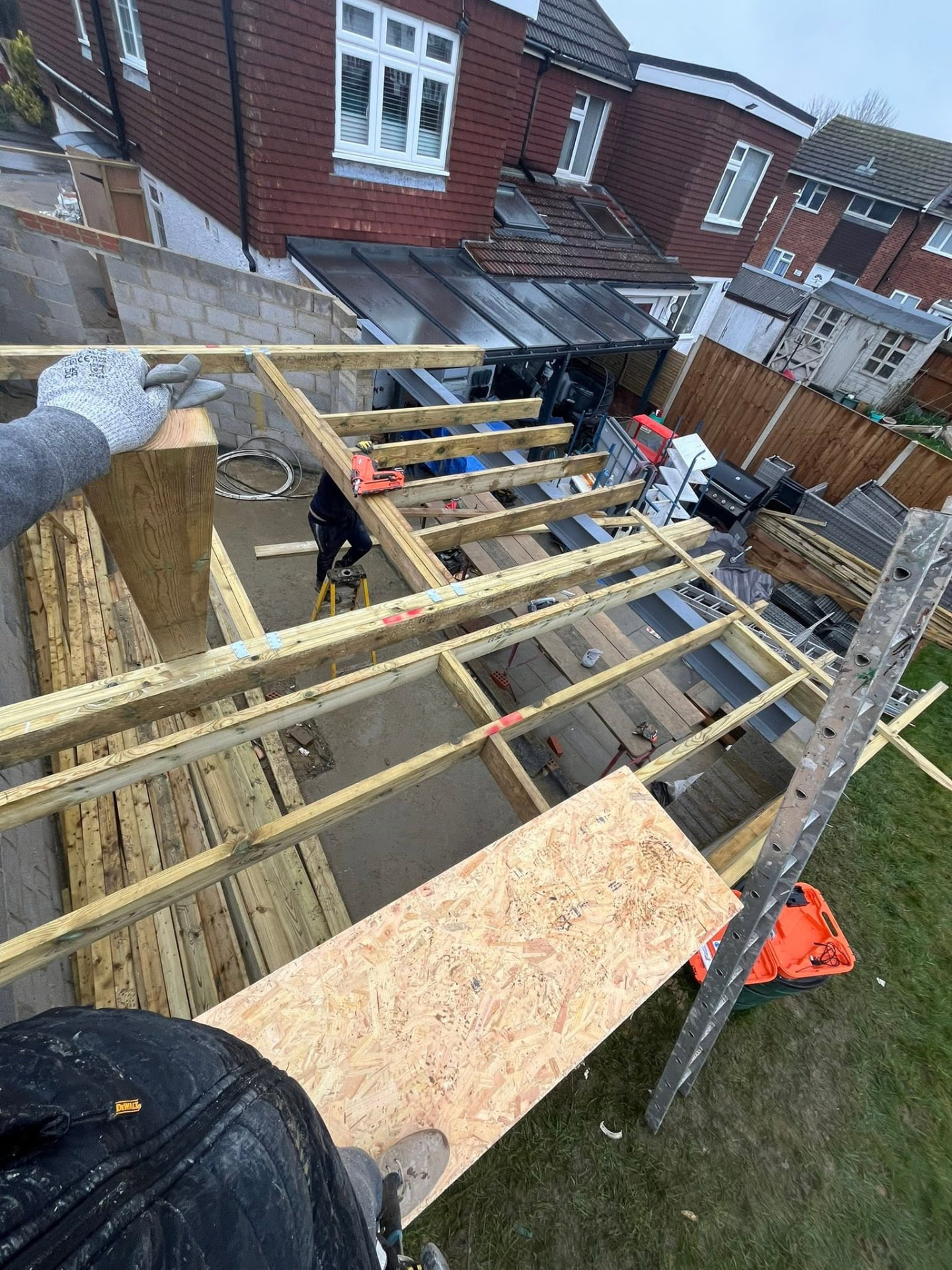 Roof joists installed with OSB boards ready to be laid