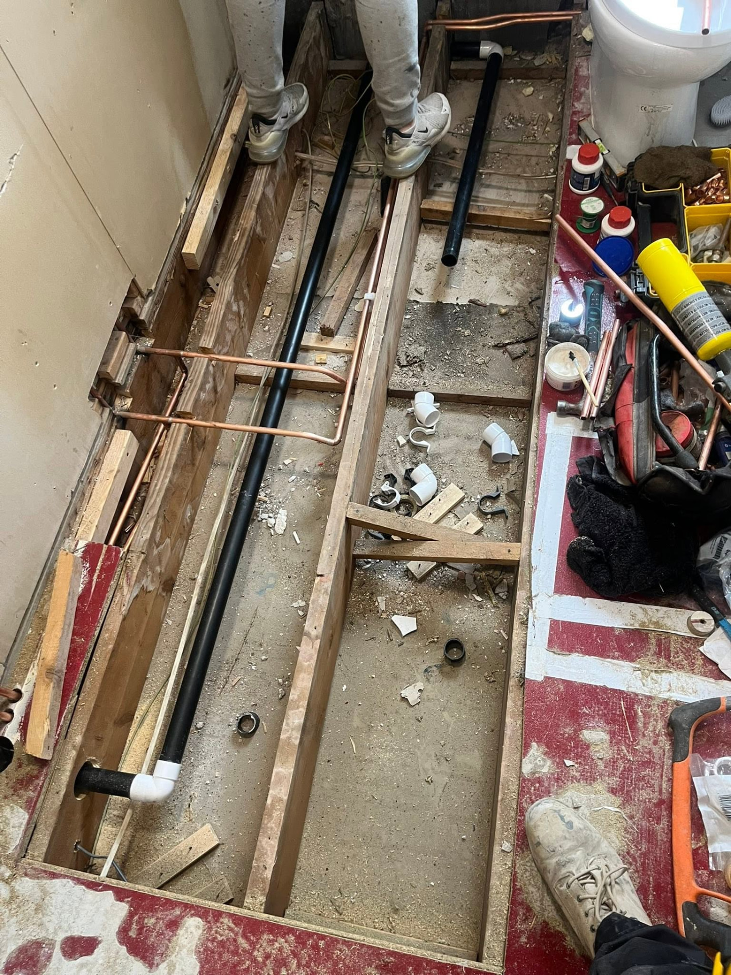 New copper and waste pipework installed beneath the bathroom floor