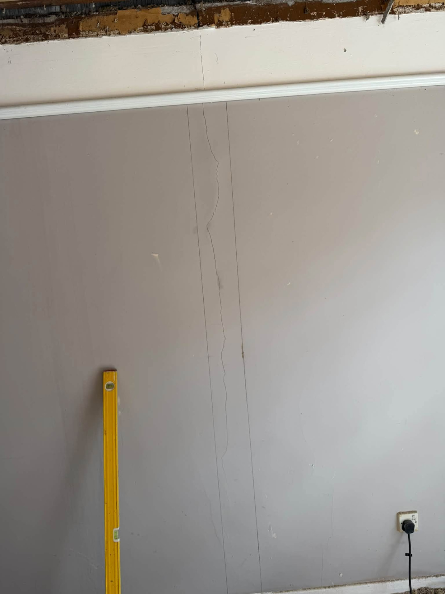 Cracked wall investigated and marked out before structural repair