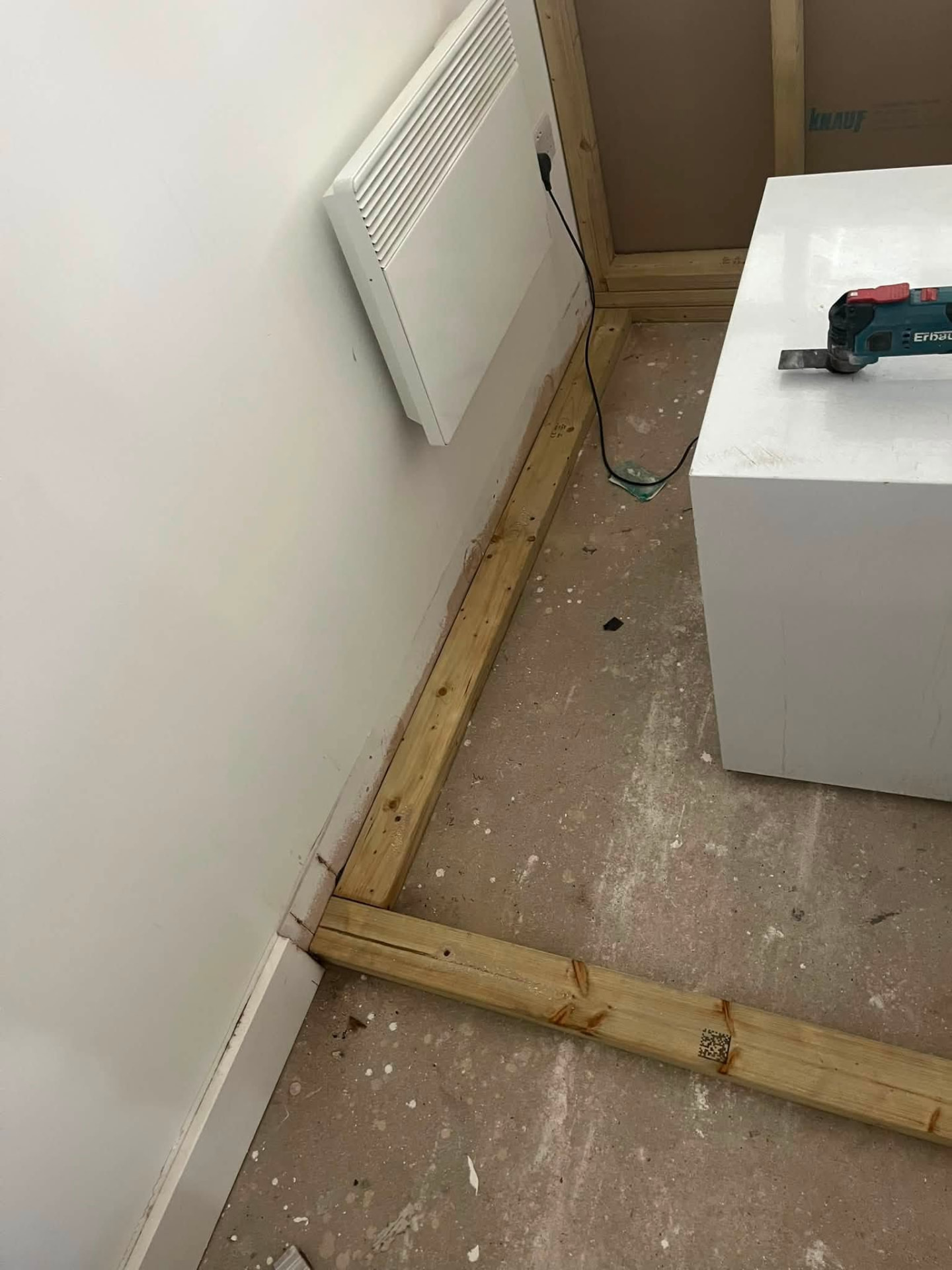 Timber base plate running along the wall ready for partition framing