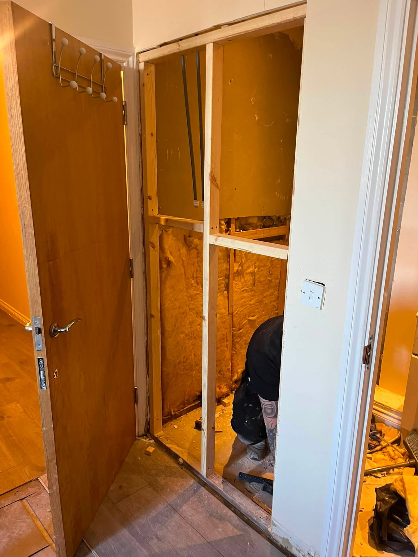Airing cupboard stripped back to studwork and insulation during the leak repair