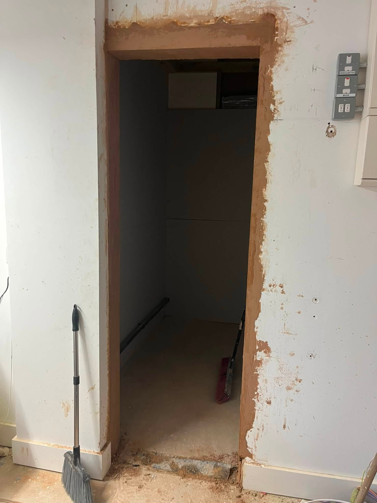 Completed doorway opening plastered and ready for the new door