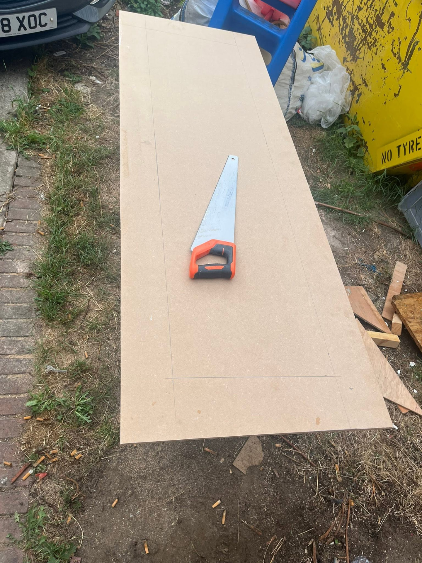MDF sheet marked out and ready to be cut for the wardrobe doors