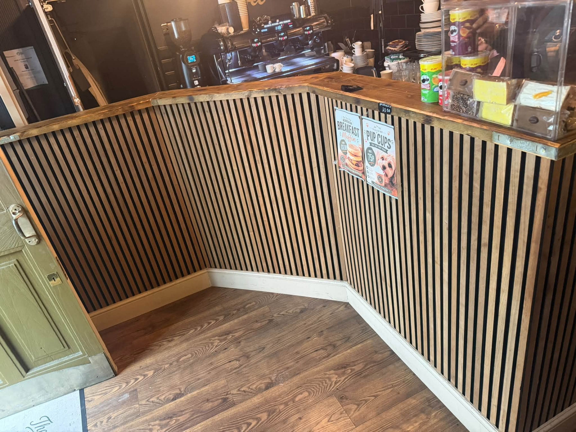 Completed bespoke counter with oak-effect slats and stained timber top
